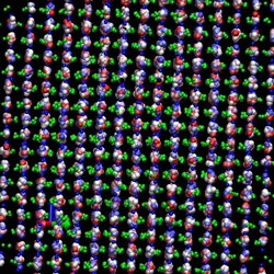 The image shows a molecular dynamics simulation of lithium niobate under a time varying electric field, which changes the sign of the polarization. Red is niobium, green is oxygen, and lithium shows a range of colors for different time steps. The niobium and oxygen are shown only for one time step for clarity. The image shows a small part of the actual simulation. Credit: Carnegie Institution 