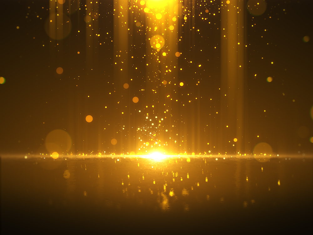 Golden bokeh glamour abstract background.