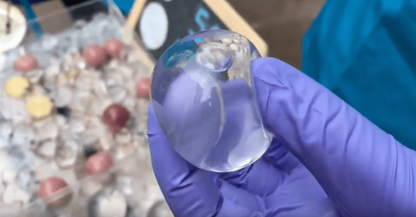 researcher holding edible Ooho blob