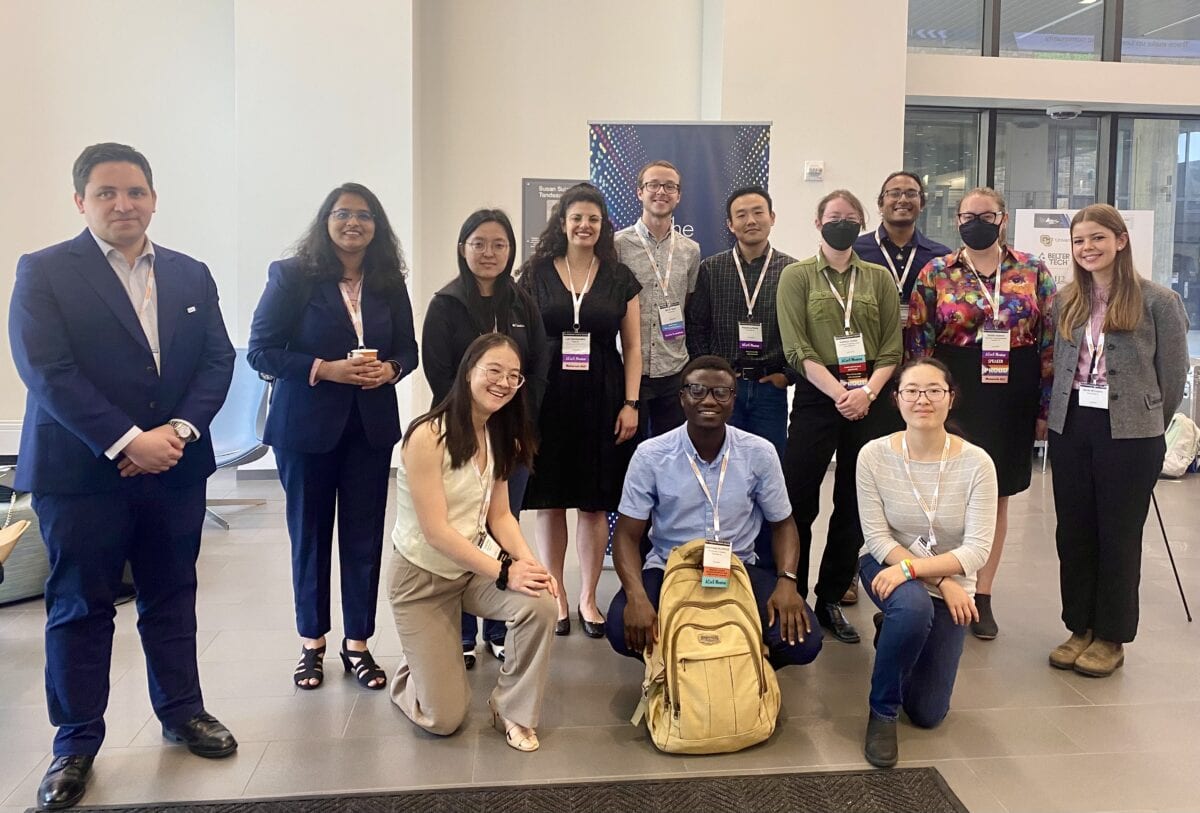 Group photo of attendees at the Advances in Cement-Based Materials conference, showcasing scientific innovation.