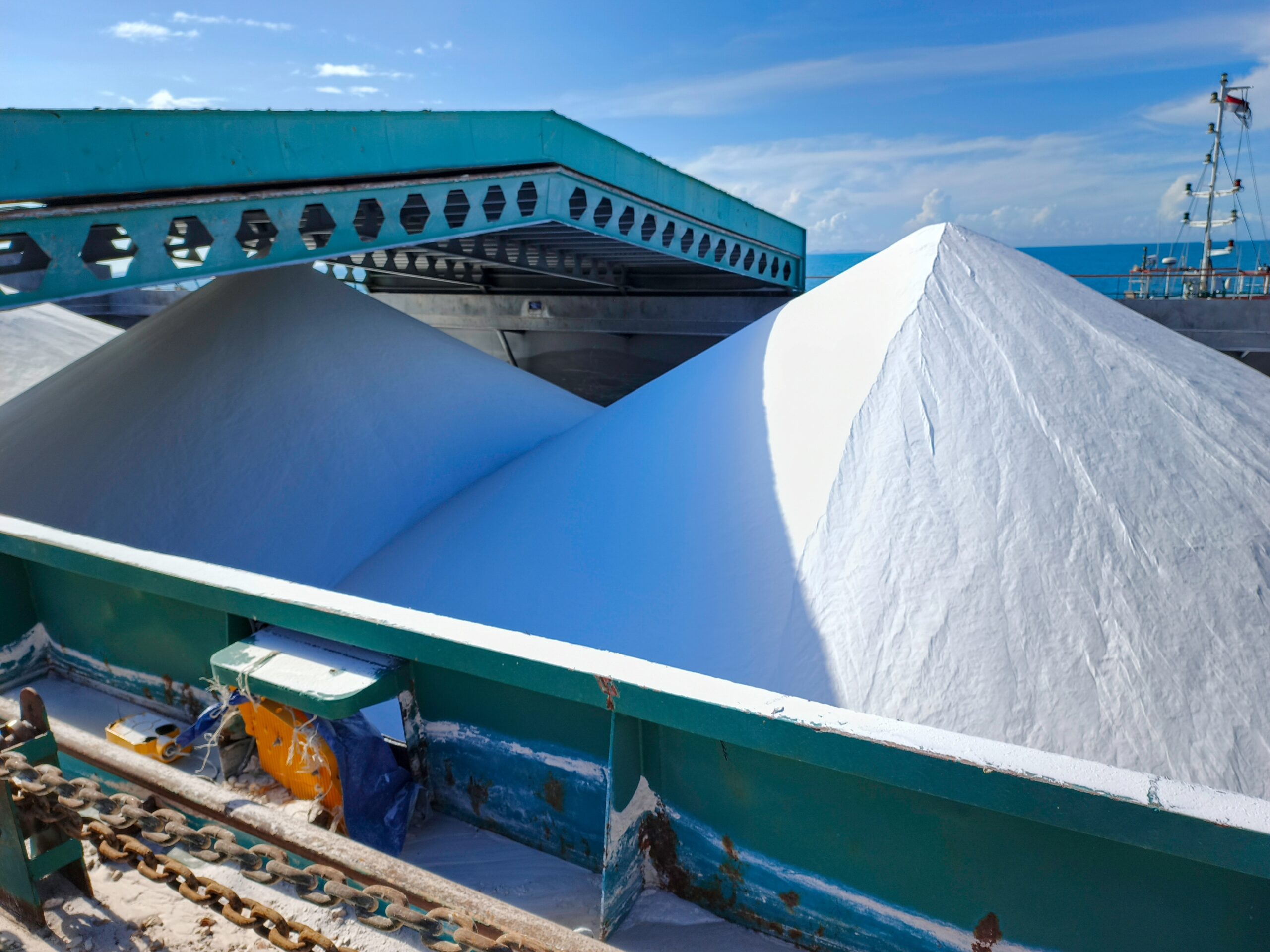 Raw alumina powder being transported on a barge