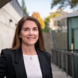 Headshot of ACerS Spring Meeting Plenary Speaker, Dr. Kathleen Richardson, smiling outdoors.